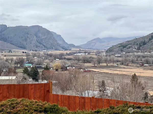 a view of a backyard with a mountain