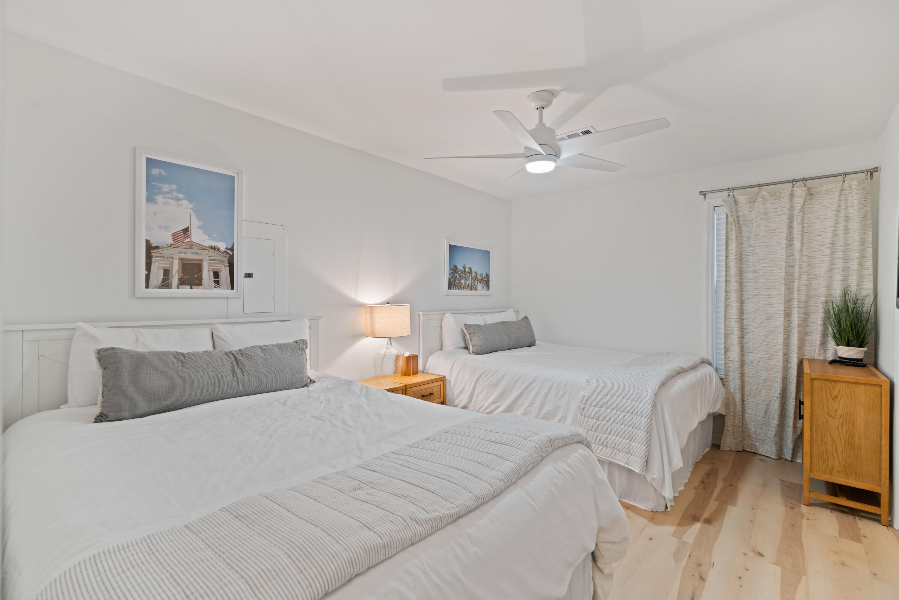 11 Beachside Drive, Unit 913 Santa Rosa Beach, FL 32459 - Photo 13 of 43 a bedroom with a bed and a chandelier