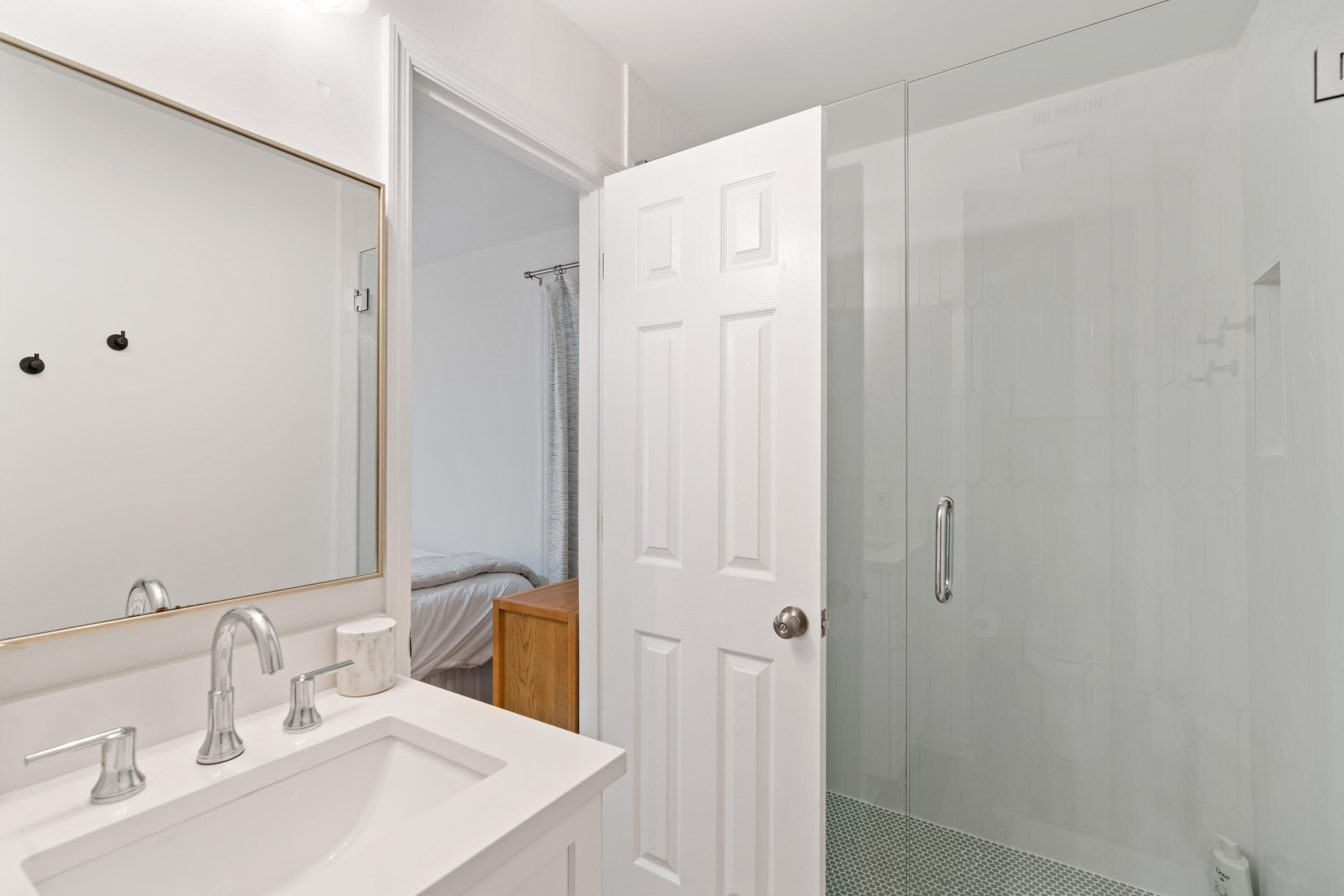 11 Beachside Drive, Unit 913 Santa Rosa Beach, FL 32459 - Photo 16 of 43 a bathroom with a sink and a mirror