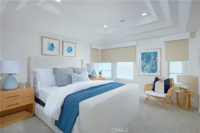 a bedroom with a bed and a couch