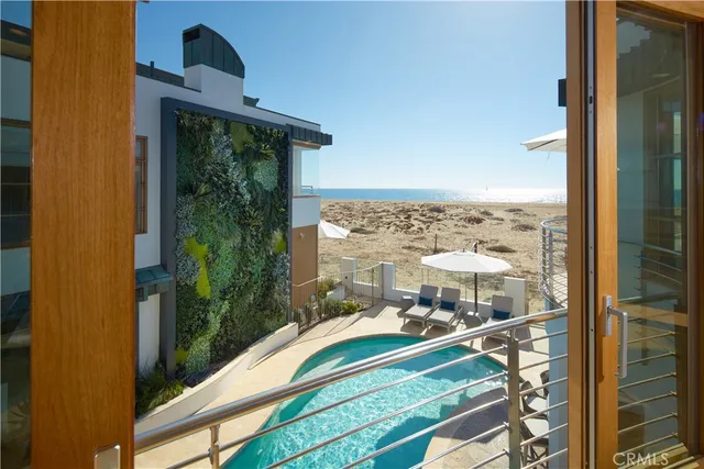 a dining room with furniture and a view of kitchen