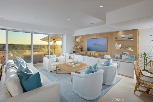 a large kitchen with a table and chairs