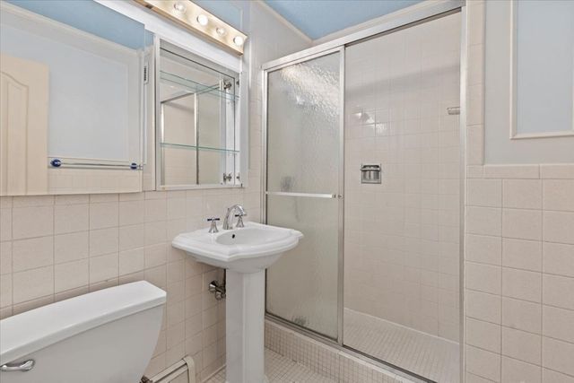 a view of a hallway with windows