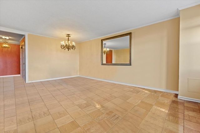 a kitchen with a stove and a microwave