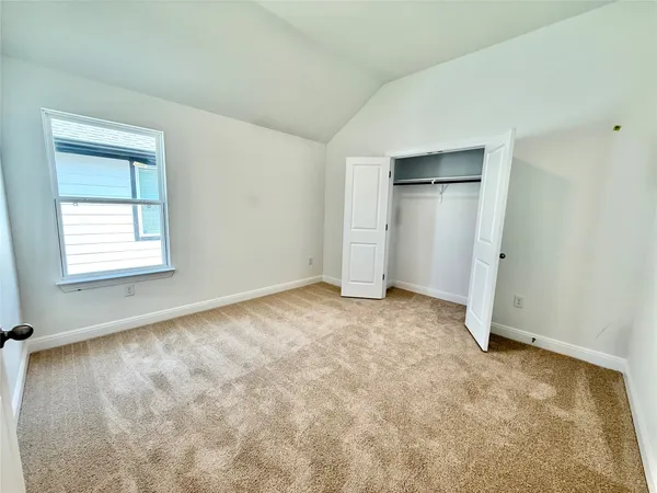 an empty room with a natural light