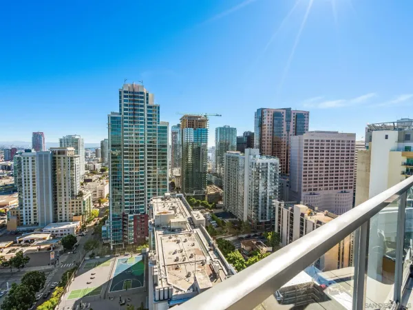a view of a city with tall buildings