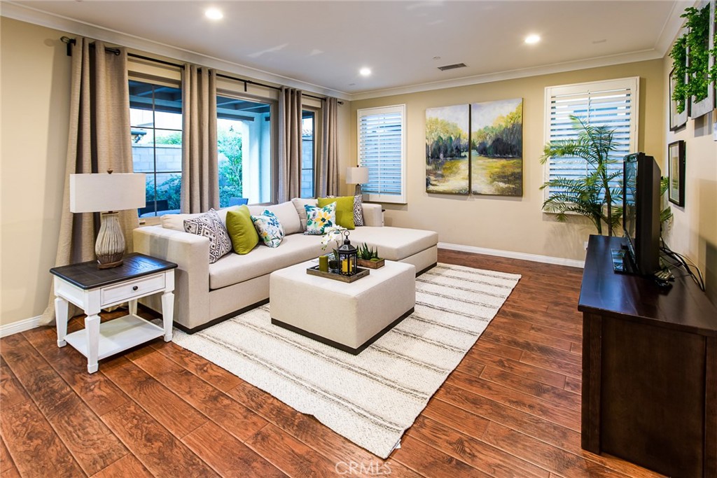 75 Gardenstone Path Irvine, CA 92620 - Photo 1 of 65 a living room with furniture and a large window