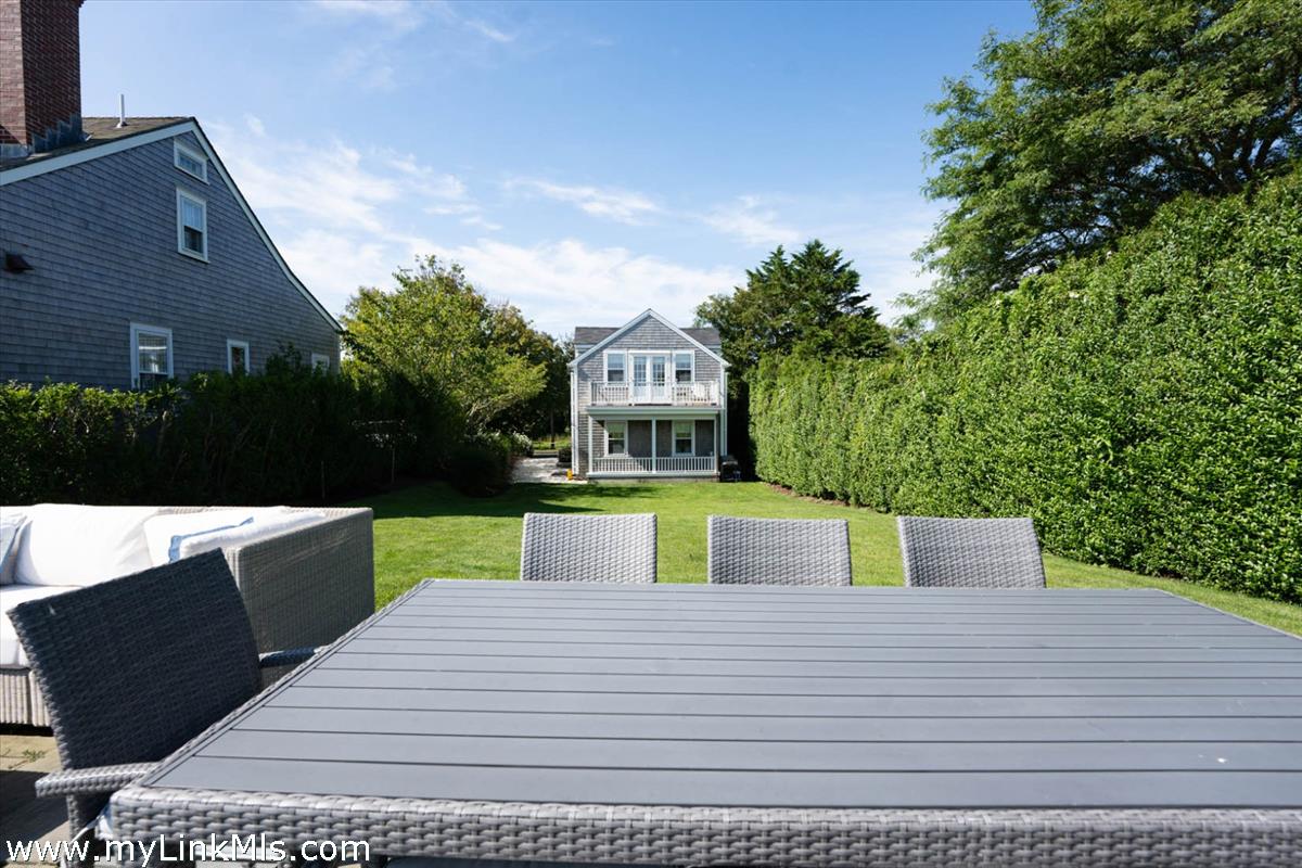 41 B Cliff Road Nantucket, MA 02554 - Photo 13 of 34 a view of house with a yard