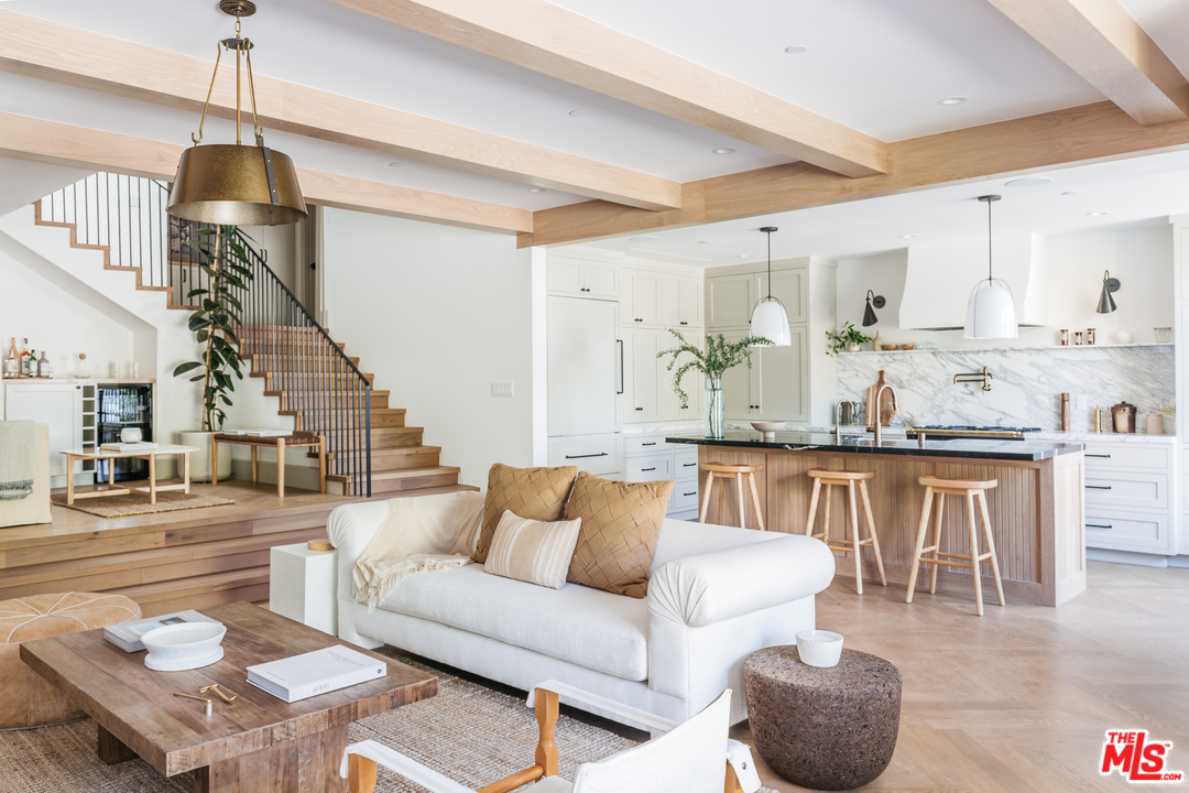 1321 North Benton Way Los Angeles, CA 90026 - Photo 2 of 27 a living room with furniture and wooden floor