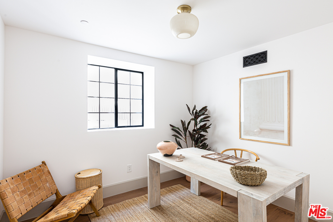 1321 North Benton Way Los Angeles, CA 90026 - Photo 18 of 27 a view of a workspace with furniture and window