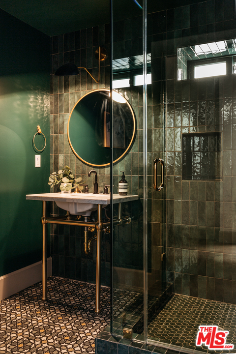 1321 North Benton Way Los Angeles, CA 90026 - Photo 19 of 27 a bathroom with a sink mirror and shower