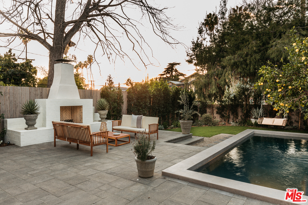 1321 North Benton Way Los Angeles, CA 90026 - Photo 23 of 27 a view of a swimming pool with a patio