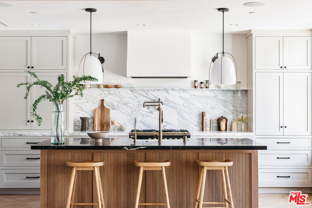 1321 North Benton Way Los Angeles, CA 90026 - Photo 7 of 27 a kitchen with sink a window and cabinets