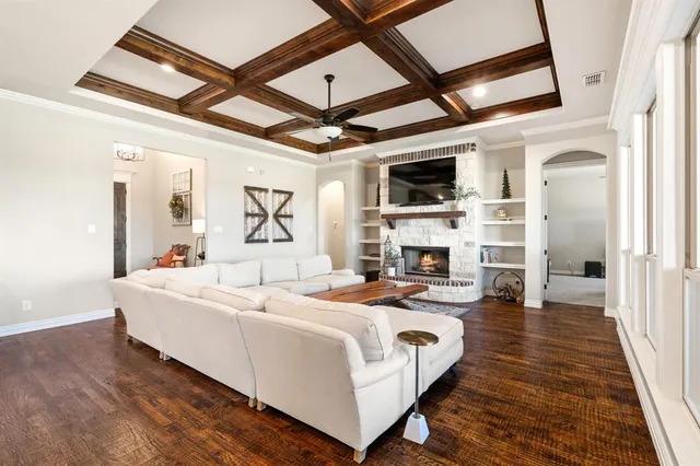 a bedroom with furniture and a chandelier