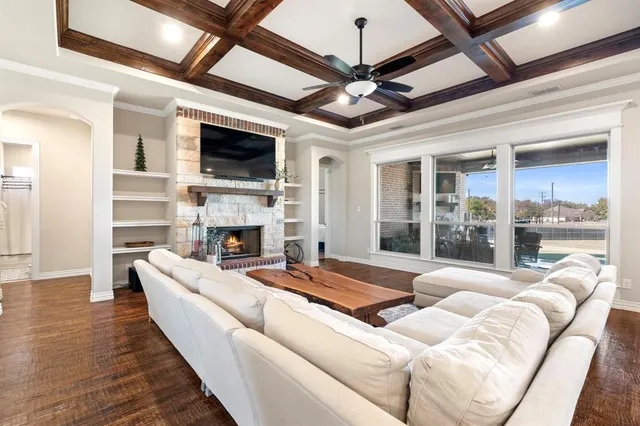 a living room with furniture and a rug