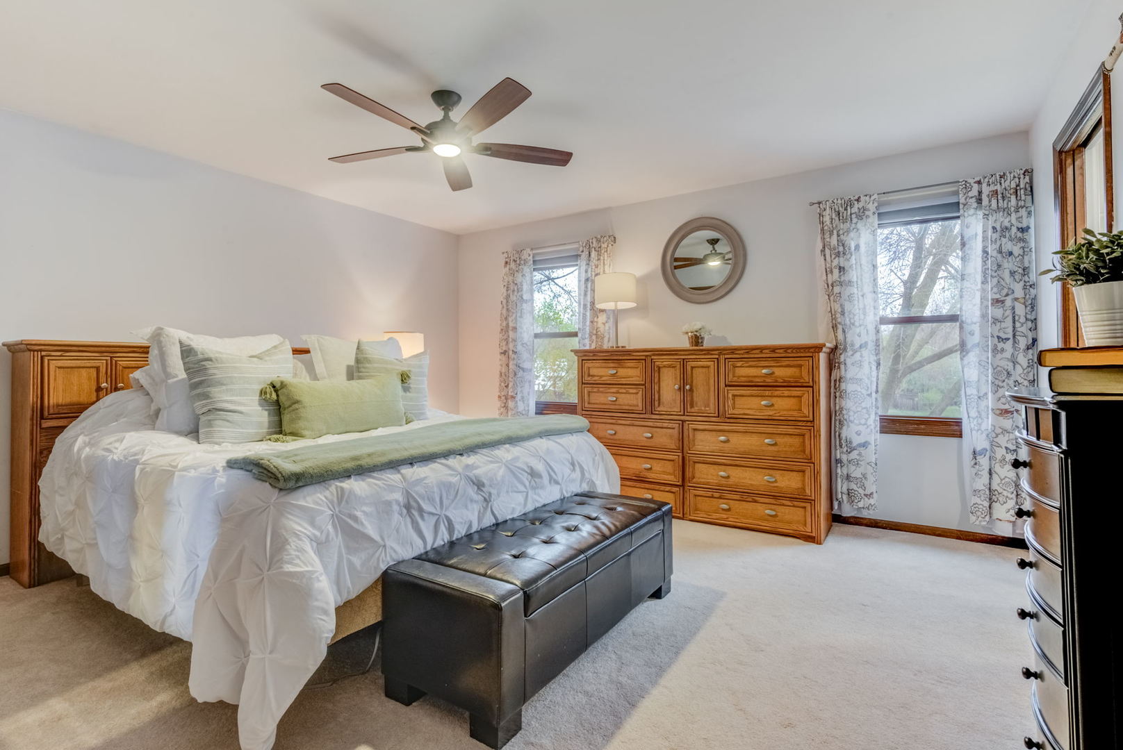 1220 Arthur Road Naperville, IL 60540 - Photo 13 of 24 a bed room with a bed and a ceiling fan