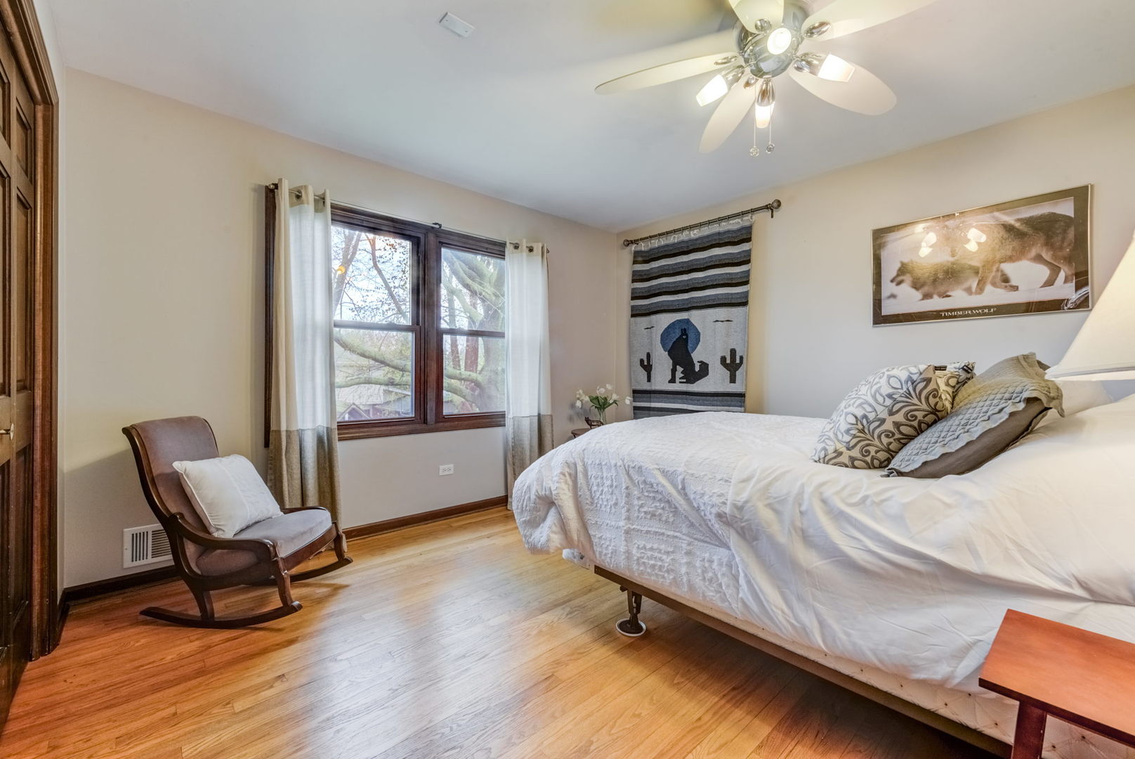 1220 Arthur Road Naperville, IL 60540 - Photo 18 of 24 a bedroom with a bed and a chair