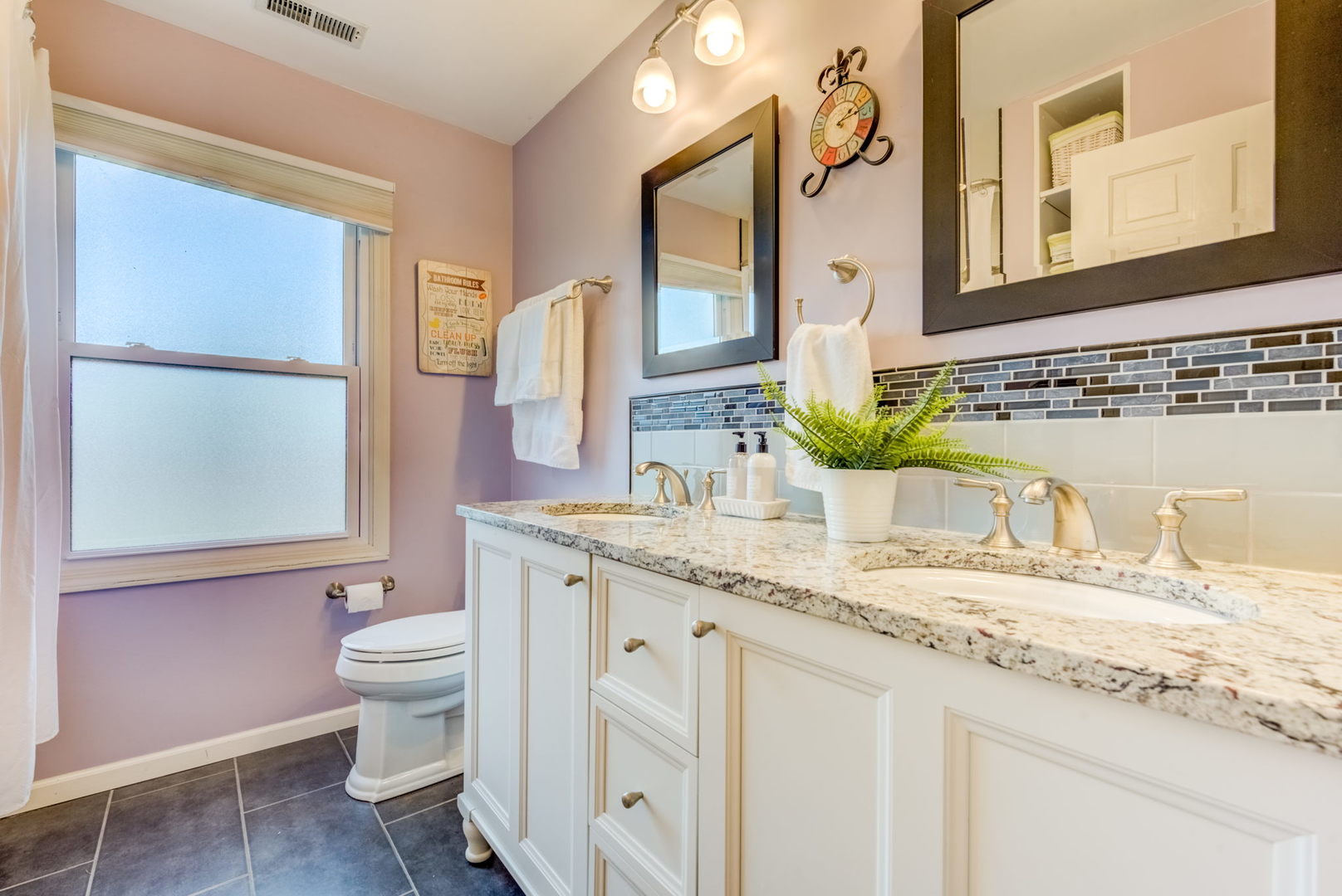 1220 Arthur Road Naperville, IL 60540 - Photo 21 of 24 a bathroom with a granite countertop sink mirror vanity and toilet