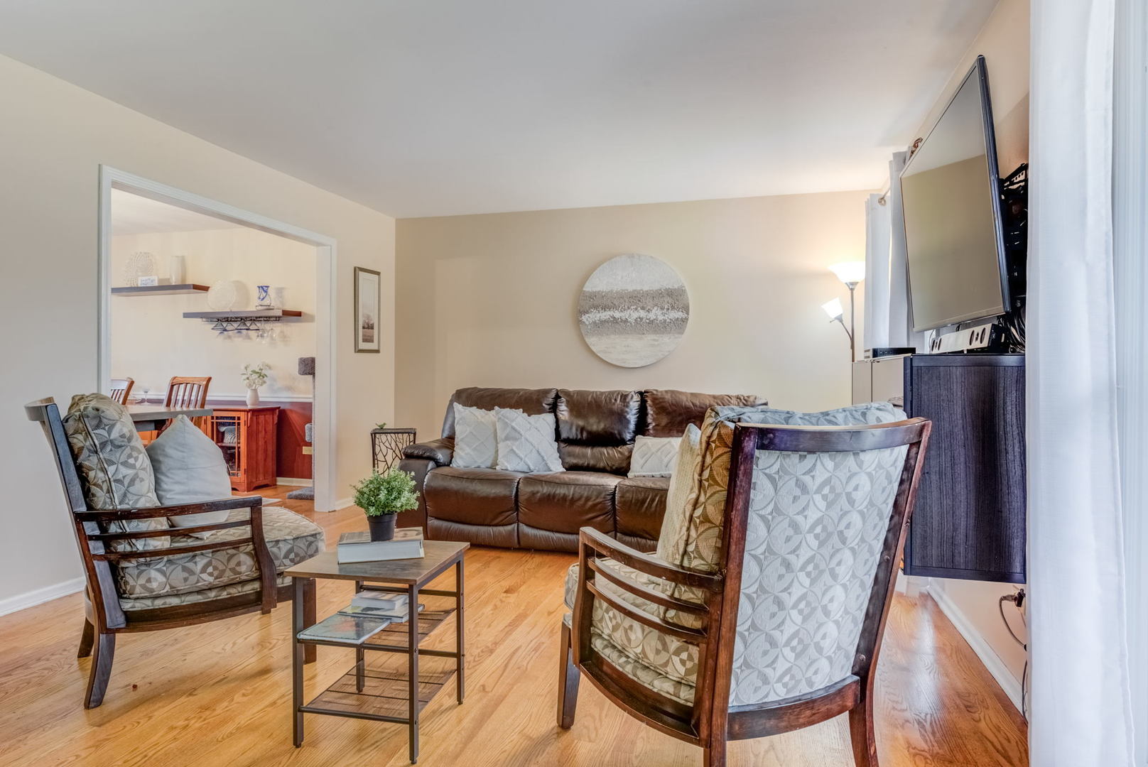 1220 Arthur Road Naperville, IL 60540 - Photo 3 of 24 a living room with furniture and a flat screen tv
