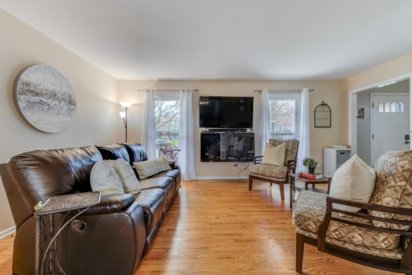 1220 Arthur Road Naperville, IL 60540 - Photo 4 of 24 a living room with furniture and a flat screen tv