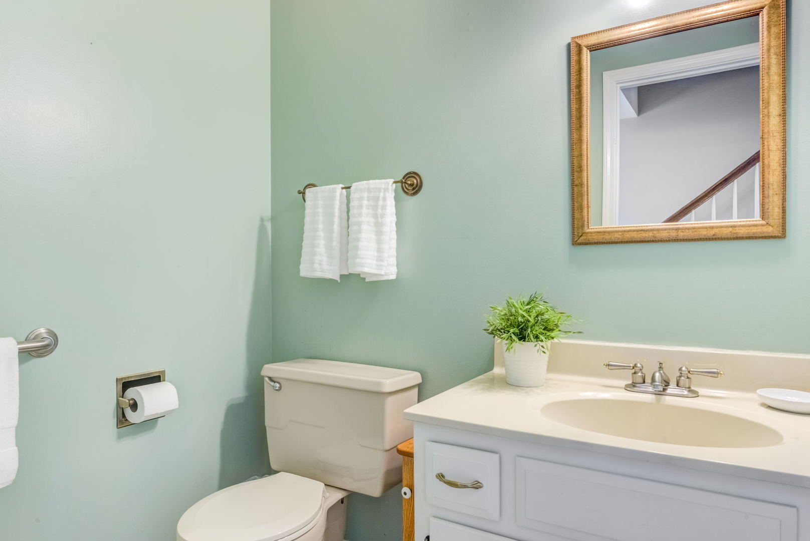 1220 Arthur Road Naperville, IL 60540 - Photo 10 of 24 a bathroom with a toilet sink and mirror