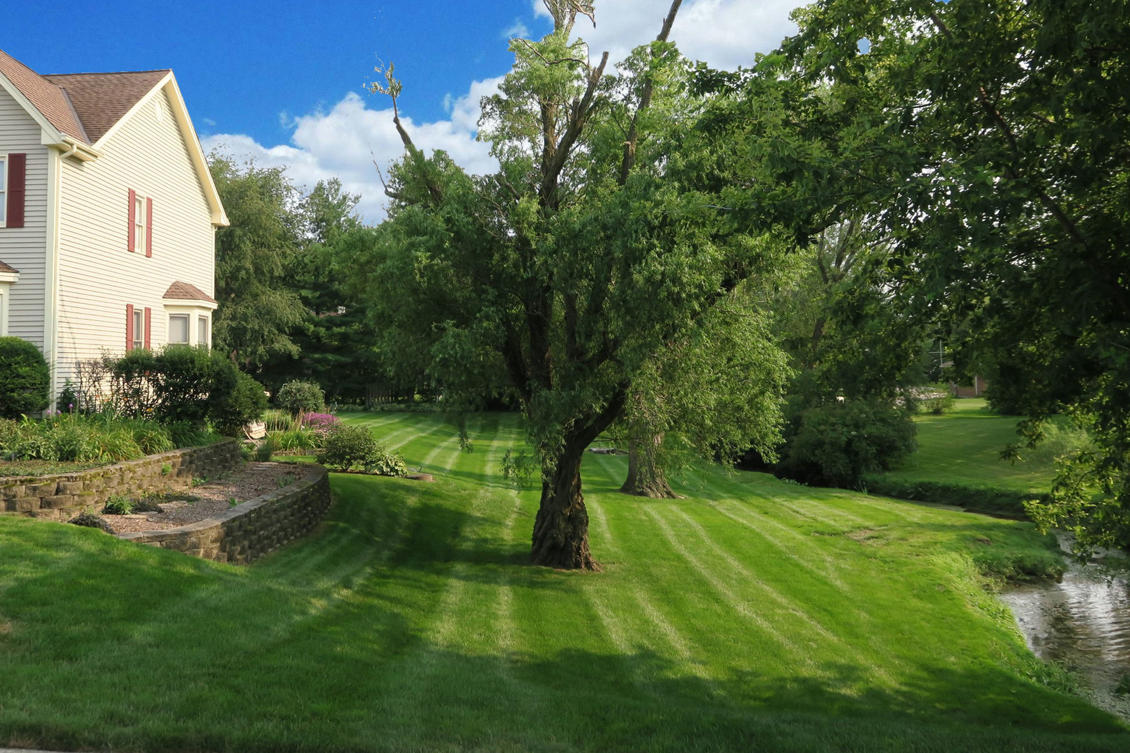 152 Wilcox Drive Bartlett, IL 60103 - Photo 3 of 51 a view of a house with a yard