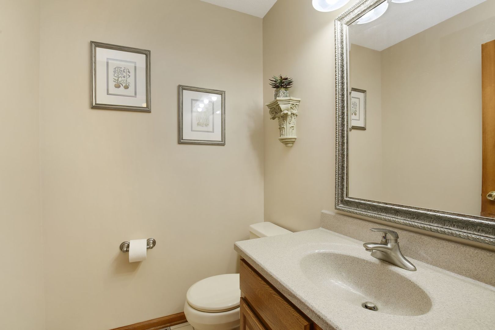 152 Wilcox Drive Bartlett, IL 60103 - Photo 22 of 51 a bathroom with a sink toilet and vanity
