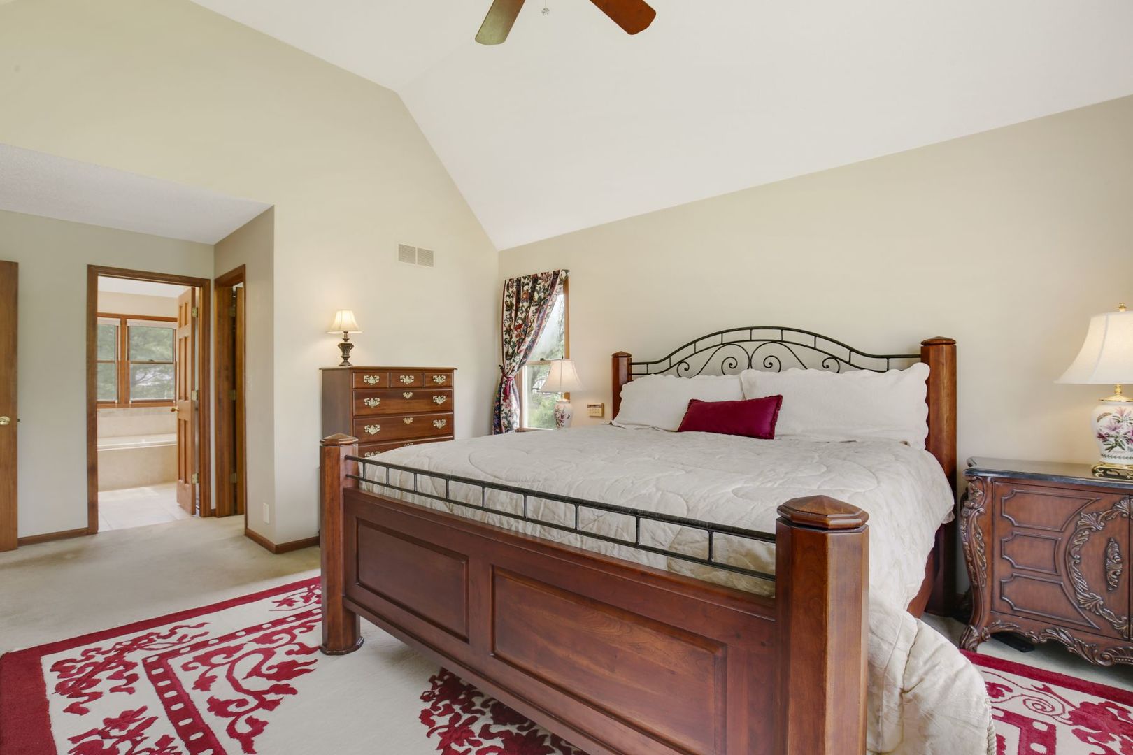 152 Wilcox Drive Bartlett, IL 60103 - Photo 24 of 51 a bedroom with a bed and wooden floor