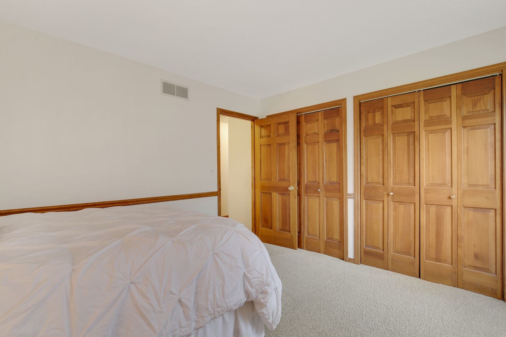 152 Wilcox Drive Bartlett, IL 60103 - Photo 29 of 51 a bedroom with a bed and a shower
