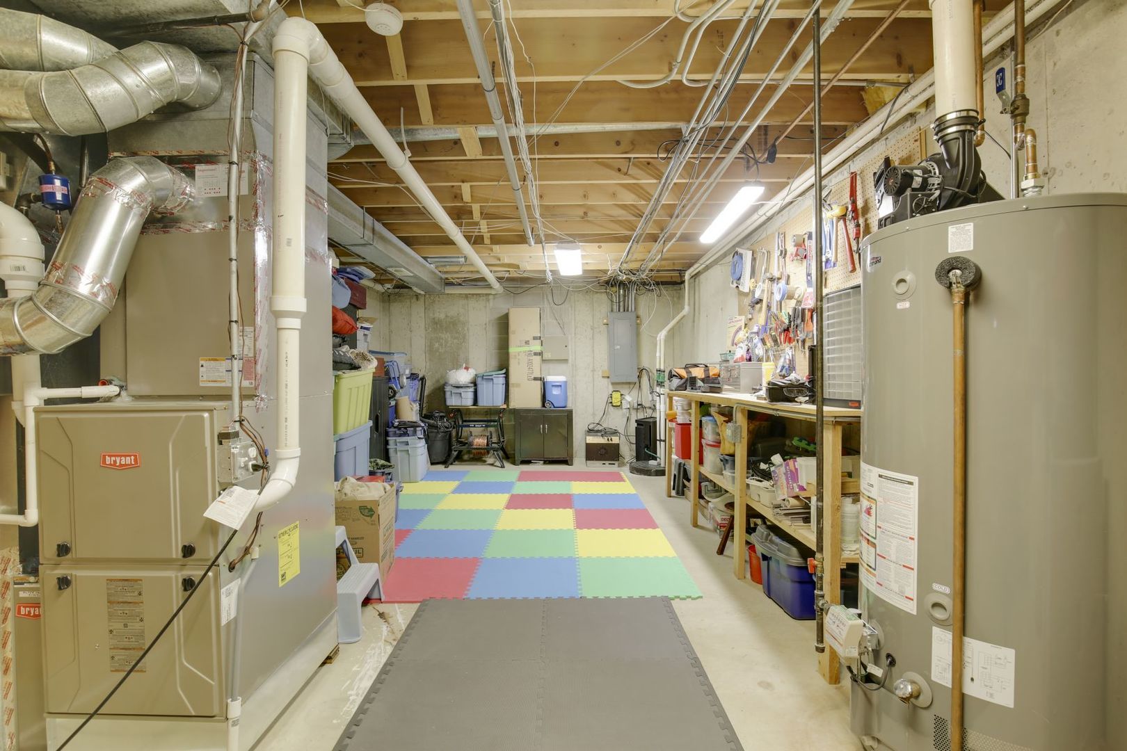 152 Wilcox Drive Bartlett, IL 60103 - Photo 39 of 51 a room with lots of white furniture and shower