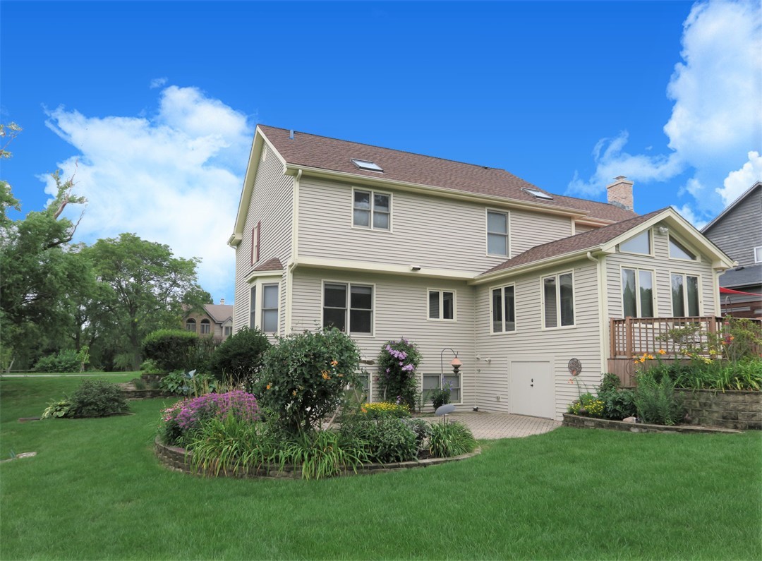 152 Wilcox Drive Bartlett, IL 60103 - Photo 43 of 51 a front view of a house with a garden