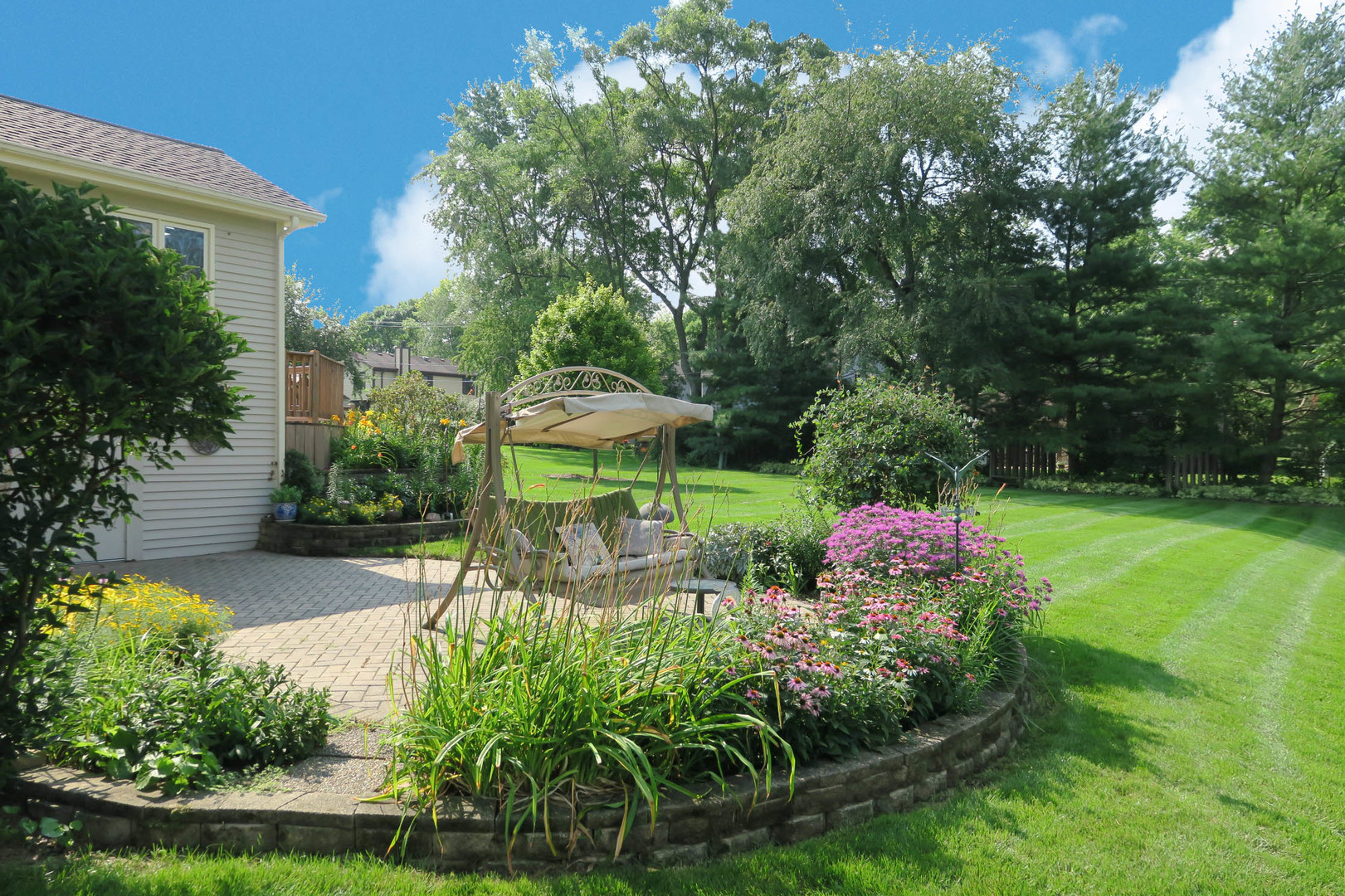 152 Wilcox Drive Bartlett, IL 60103 - Photo 49 of 51 a garden view with a seating space