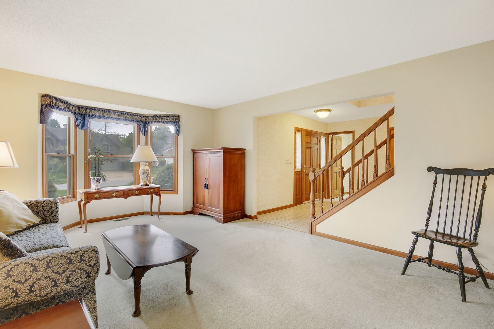 152 Wilcox Drive Bartlett, IL 60103 - Photo 7 of 51 a living room with furniture and a large window