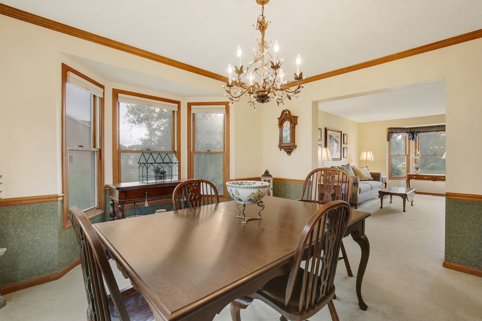 152 Wilcox Drive Bartlett, IL 60103 - Photo 10 of 51 a view of a dining room with furniture and chandelier