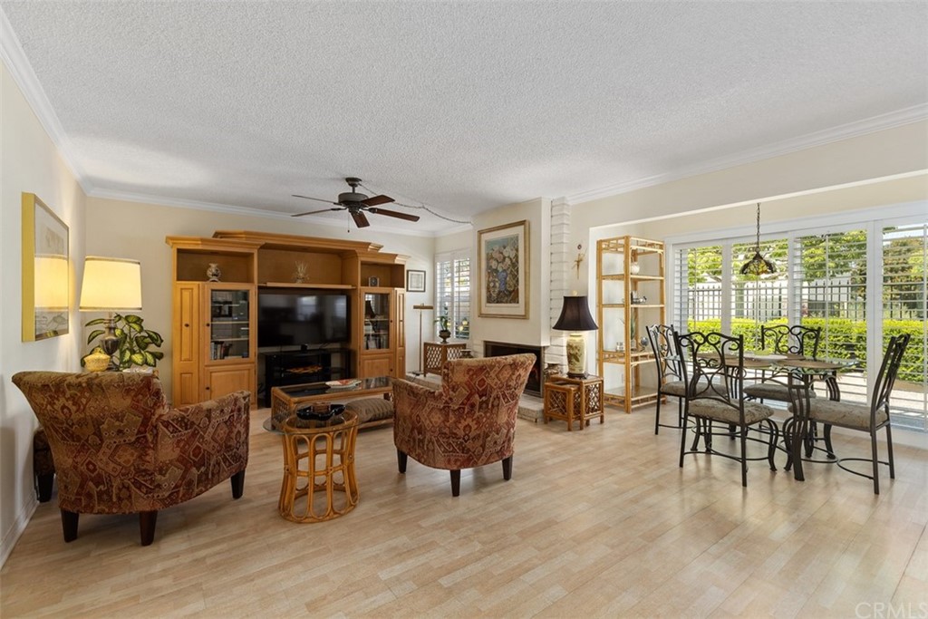 10 Mandrake Way Irvine, CA 92612 - Photo 13 of 35 a living room with furniture and a flat screen tv