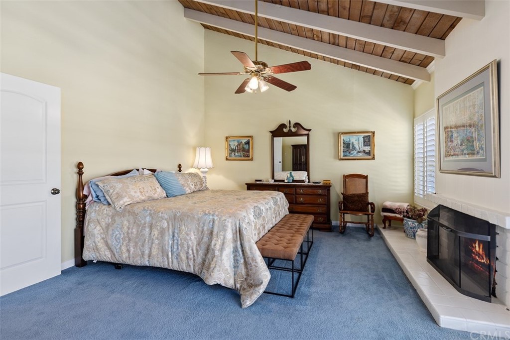 10 Mandrake Way Irvine, CA 92612 - Photo 26 of 35 a spacious bedroom with a bed a couch and dresser