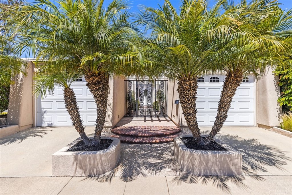 10 Mandrake Way Irvine, CA 92612 - Photo 3 of 35 a vase of flowers sitting on a table