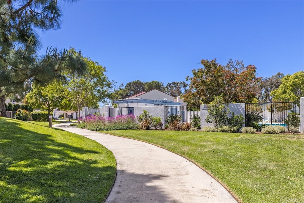 10 Mandrake Way Irvine, CA 92612 - Photo 34 of 35 a front view of a house with a yard and trees