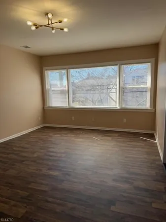 a bathroom with a toilet a sink a bath tub and a shower