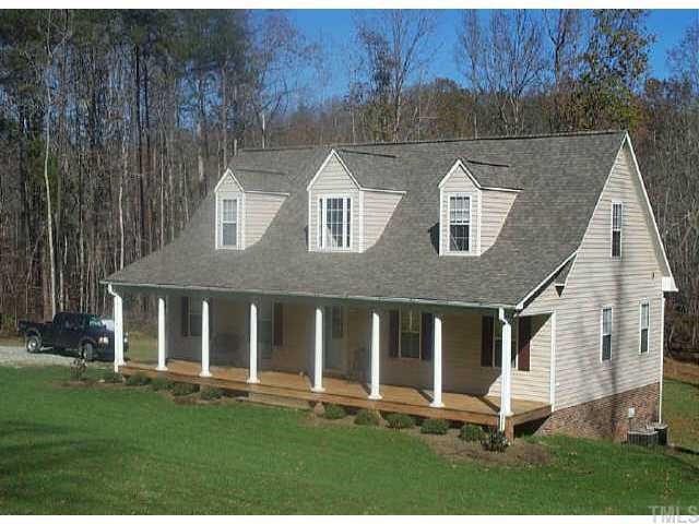 380 Shannon Road Timberlake, NC 27583 - Photo 1 of 1 a front view of a house with a yard