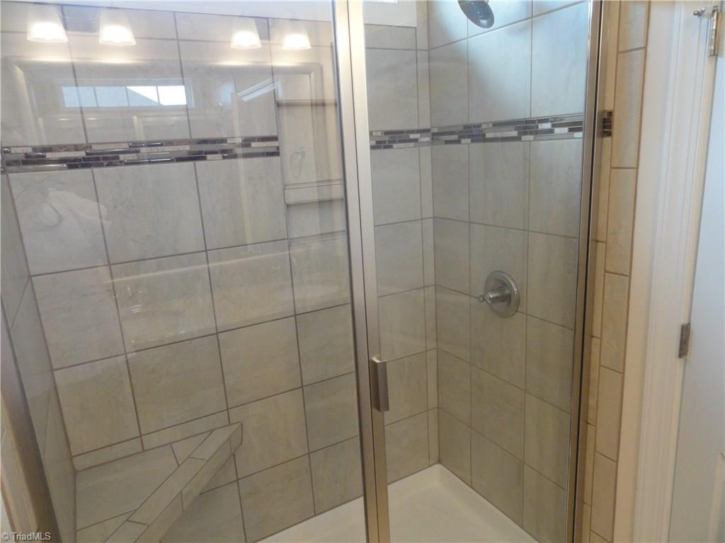 2814 Fallin Court High Point, NC 27262 - Photo 15 of 16 Master tiled shower with seat