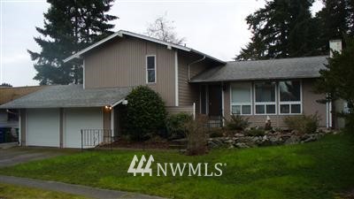4339 Northeast 17th Street Renton, WA 98059 - Photo 1 of 1 a view of front of a house with a yard