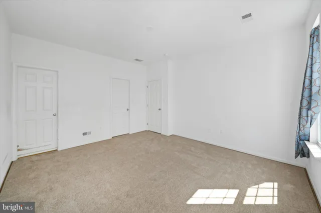 a view of small space with racks on the wall