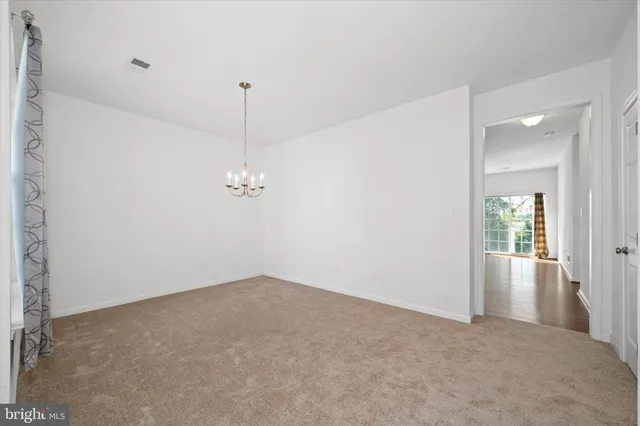 a view of a room with an empty space