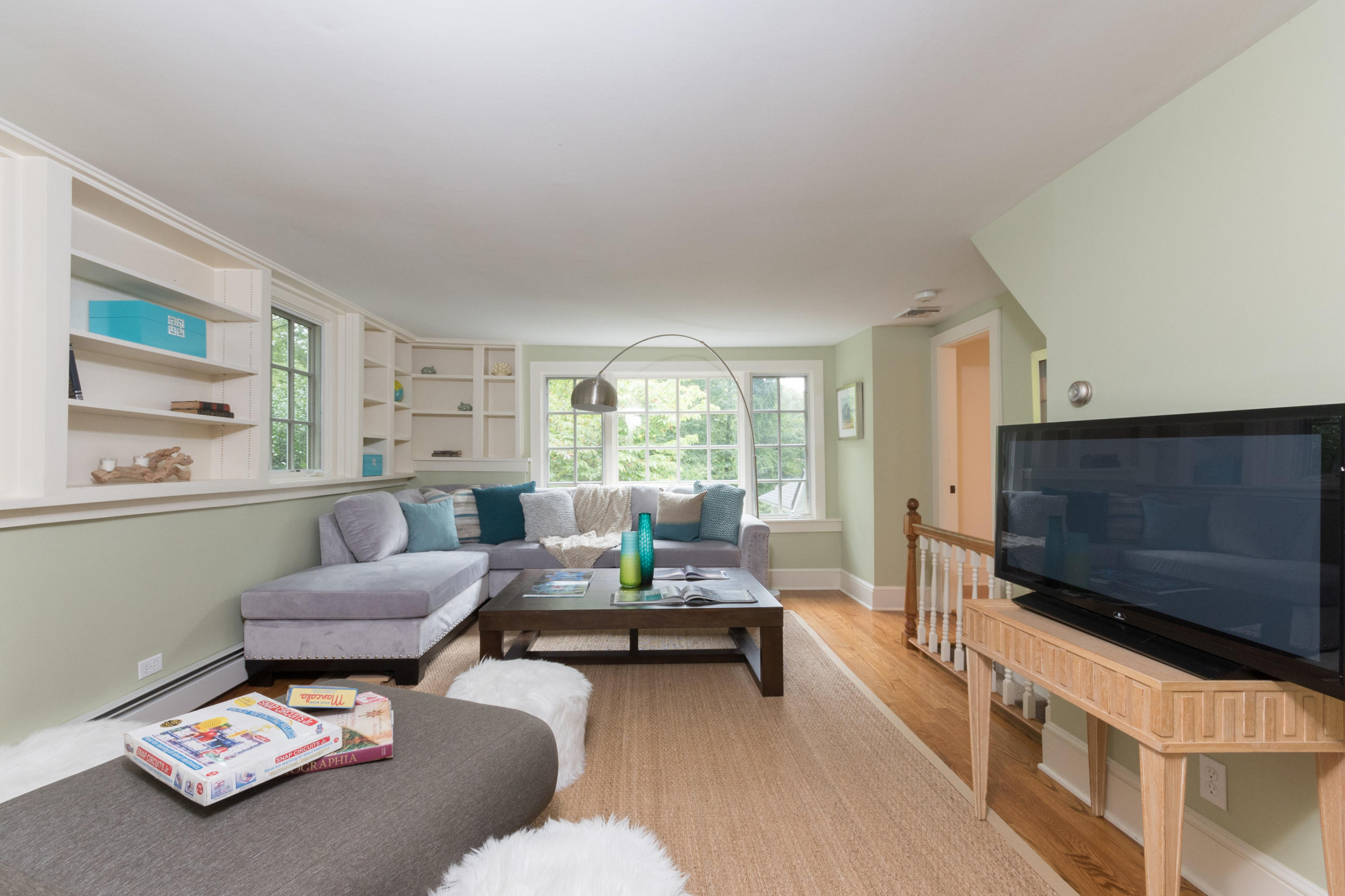 55 Cedar Gate Road Darien, CT 06820 - Photo 15 of 41 a living room with furniture and a flat screen tv