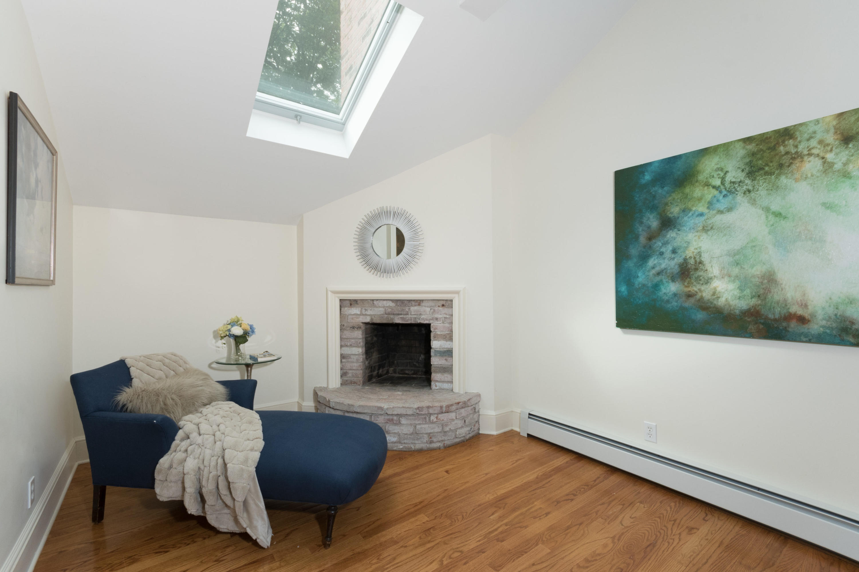 55 Cedar Gate Road Darien, CT 06820 - Photo 23 of 41 a living room with furniture and a fireplace