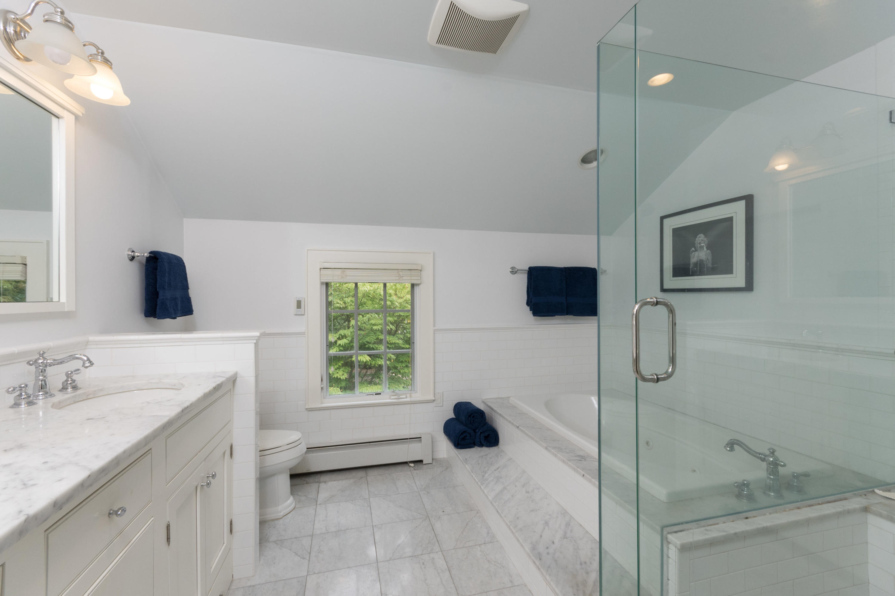 55 Cedar Gate Road Darien, CT 06820 - Photo 24 of 41 a bathroom with a sink a toilet a tub and mirror