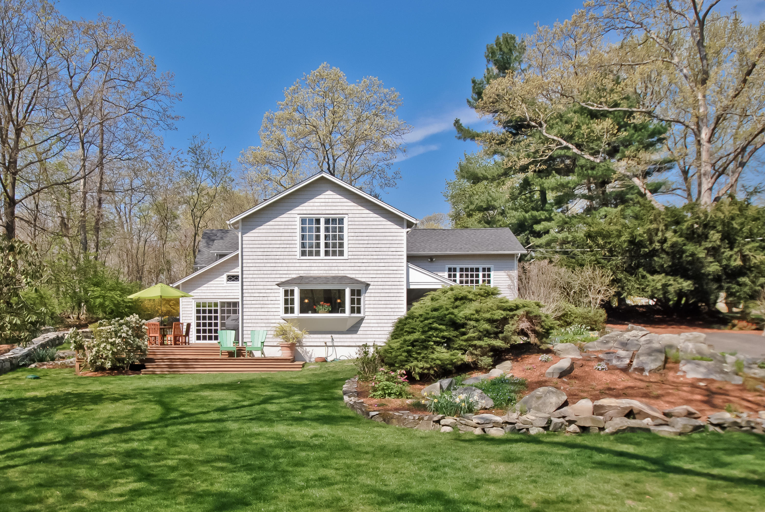 55 Cedar Gate Road Darien, CT 06820 - Photo 37 of 41 a view of a house with a yard