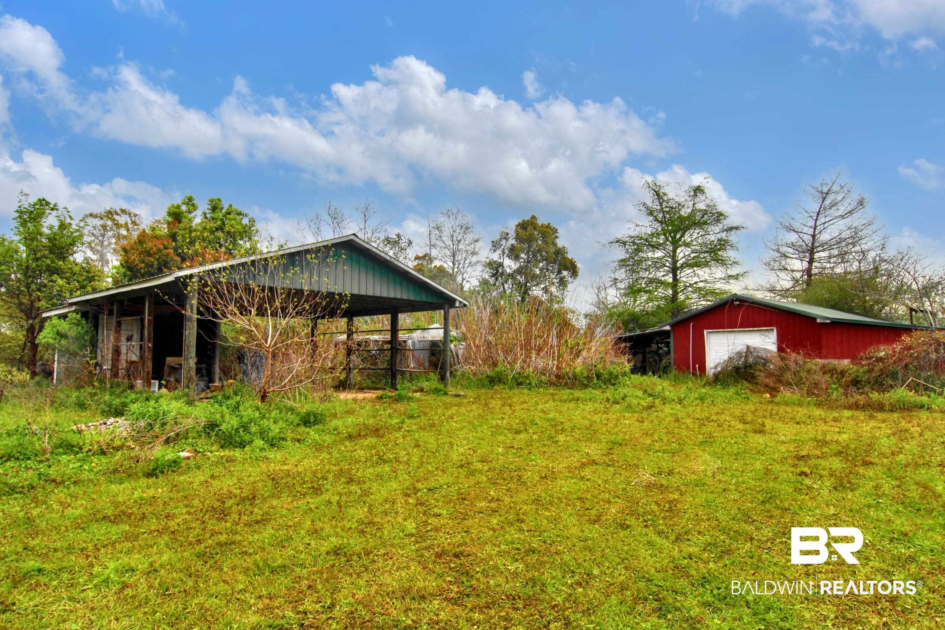 12897 County Road 65 Foley, AL 36535 - Photo 20 of 21 View of yard with an outbuilding