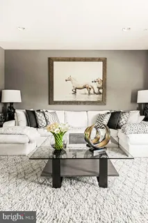 a kitchen with a two sink and a large window